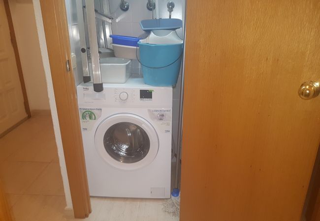Lavadora dentro de un cuarto Lavadora